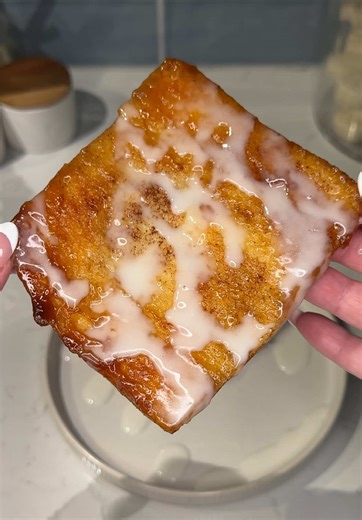 these viral honey butter crescent squares are giving homemade toaster strudel and I’m so here for it 🍯🥐 Ingredients: 1 can @Pillsbury crescent roll dough sheet 1/2 cup honey 1 stick butter cinnamon sugar 1/2 cup powdered sugar 1-2 tbs milk 1/2 tsp vanilla extract Instructions: Unroll the crescent dough sheet and slice into 6 squares. On a large parchment lined baking sheet, drizzle 6 dollops of honey, topping each with 2 pads of butter. Sprinkle with cinnamon sugar and top with 1 square of cre