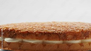 Bee sting cake, light cake with cream filling, with crispy almonds