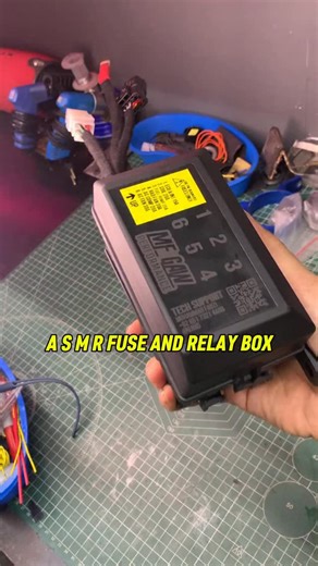 Muhammad Fauzi 🔋 on Instagram: "Sometimes the smallest part in a build ends up carrying the biggest responsibility. Today we went full #ASMR workshop mode, working on the 6-Way Fuse & Relay Box from the very first touch. Pulling circuits from the rack one by one, opening the sockets, checking pin positions, and laying down the laser marking on the lid—clean, slow, and intentional. No rush, no talking… just the sound of clicks, plastic sliding into place, and the laser tracing diagrams li