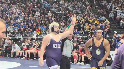 New Ulm Area's Emerson Johnson secures the pin at heavyweight to give the NUA Eagles a 53-17 win over Totino-Grace. The win moves NUA to the state semifinals tonight at approximately 8 p.m. | The Journal, New Ulm, Minn.