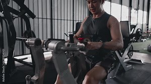 Pec Deck Fly Machine, Men exercise to increase chest muscles, Building Forearm Strength, Bodybuilders Intense Gym Workout with Weight Machine.