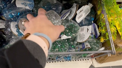 She uses dollar store gems for a genius organizing hack!