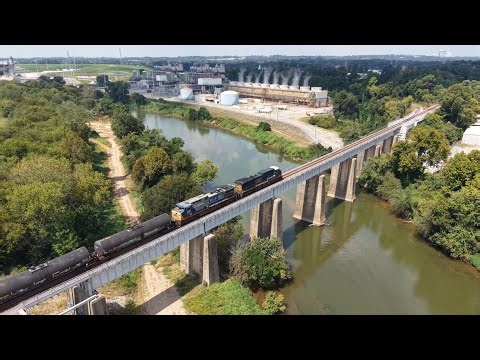 The Morning Transfer Waits on Amtrak 19, Converging Trains and a CSX Freight Crosses the River