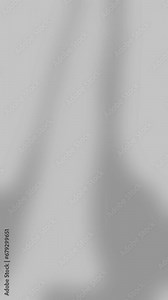 Blurred Grayscale bright lights on gradient background. Seamless loop footage. Soft gradient background. Fluid liquid grayscale smooth animation.