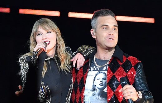Robbie Williams Joins Taylor Swift Onstage at Wembley for Surprise “Angels” Performance