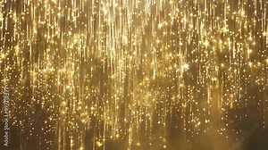 Glittering gold rain falls against a blurred golden background.