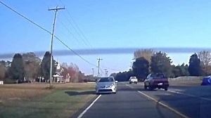 Watch this Tesla escape a rear end collision thanks to its ridiculous acceleration