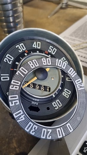 Otis J. Gore on Instagram: "Weeks of trial and error, making mockups, calibrating at various speeds with my phone's GPS speed,... Finally I think I have the correct spacing for the digits 😊💪🏽 I needed to change the dial from MPH to KPH and account for the non-standard front tyre size. (fun fact, the progression of the speedo needle isn't linear) Now to get a few printed on adhesive vinyl and apply it to the clock face 😉👌🏽 The Odyssey continues. #theodysseycontinues #odysseygarage #CalLook 
