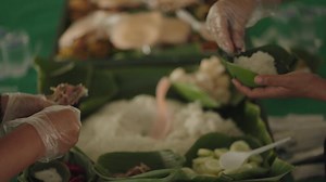 A variety of traditional dishes from Solo, Central Java, Indonesia, showcasing the rich culinary heritage with rice, side dishes, and traditional cake