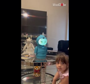 Girl is captivated by Moxie, the world's first AI robot for kids