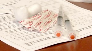 Rollout issues dampen Covid-19 vaccine optimism