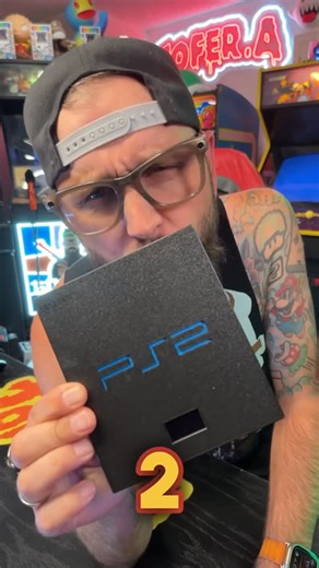 Kristofer Adams on Instagram: "This is a real deal PlayStation 2… it’s the newest creation by @drmodslab Let’s take a look at it real quick and ask the question.. what PS2 game do you play first? See @drmodslab for inquires #videogames #ps2 #00s #nostalgia"