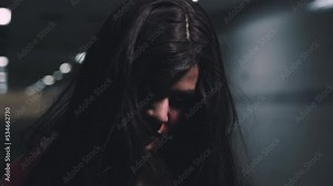 Bloody halloween makeup. Close up of horror bloodthirsty ghost female with fade drop out from eyes, Asian woman with blood eye she death and scary with blood tear on face, Happy halloween day concept