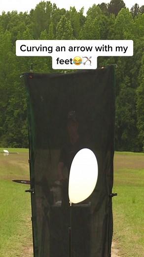 Curving an arrow with my feet 🏹🎯 #archery #fyp #ReadySetShop #WalmartSyncAlong