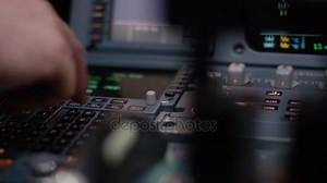 Panel of switches on an aircraft flight deck. Autopilot control element of an airliner. Pilot controls the aircraft. Onboard computer, cockpit