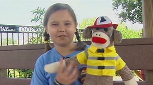 Girl builds sock monkeys to help heal