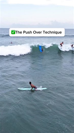 Hanging Surf Club | Bali Longboard School on Instagram: "Push-over technique to get past the white water 🏄‍♂️ Stay low. Stay forward. Glide through 🎯 Join @hangingsurf to start or improve your longboard skill 🎯 Dm or link in bio 📍"