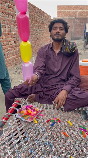 Amazing young boy making balloon nycc colours #short #viral #balloons