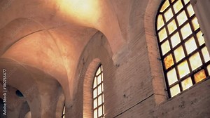 Ancient architecture building. Stained glass windows, stucco molding and columns