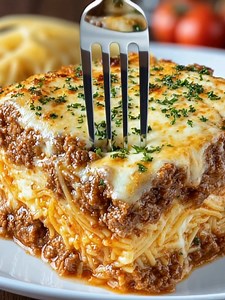49K views · 436 reactions | Million Dollar Spaghetti Bake Layers of rich meat sauce, creamy cheese, and golden spaghetti baked to bubbling perfection — pure comfort in every bite. Yield: 6–8 servings | Temp: 350°F (175°C) | Time: 50 minutes Key Ingredients First: 1 lb spaghetti, cooked al dente 1 lb ground beef 8 oz cream cheese, softened ................................. Full Recipe in First Cօʍʍеոτ  | Kitchen Pop | Facebook