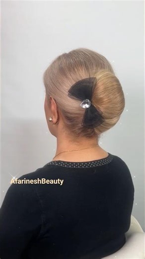 Side French Roll Updo for a Soft Luxury Look
