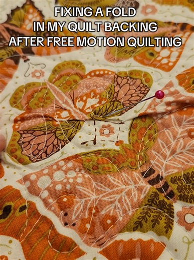How to fix a fold in quilt backing after free motion quilting.
