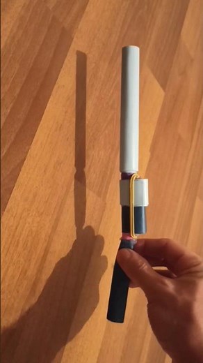 Paper gun that shoots paper bullets