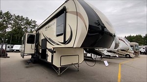 2018 KZ Durango 2500 325RLT — Pre-Owned Fifth Wheel A luxury fifth wheel with a rear living room floor plan, electric fireplace, two recliners, dining table / chairs, kitchen island, front queen bed, and plenty of storage. Sale price does not include sales tax, title, or registration. General Specifications • Stock Number: UFW19121 • Sleeping Capacity: 4 • Empty Weight: 10,610 lbs • Fresh Water Capacity: 67 gal. • Air Conditioners: 2 • Slide-outs: 3 • Interior Color: Aurora • Exterior Height: 12