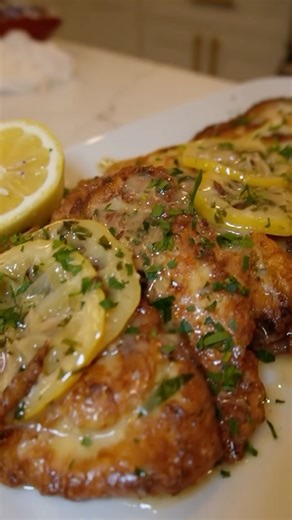 Ayesha Nurdjaja on Instagram: "Chicken Francese—courtesy of yours truly ✨. There’s just something magical about the way lemon brightens up tender chicken. 🍋It’s classic Italian-American comfort with a little chef-y flair. Perfect for summer dinners, and honestly, a forever favorite in my kitchen."