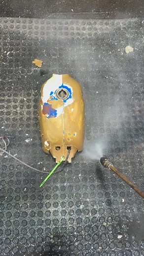 Chemical dipping a Honda motorcycle fuel tank to remove layers and layers of paint. This one took 3 dips to get it down to bare metal. There were quite a few layers of paint on this one. #restoration #honda #motorcycle #classic #oddlysatisfying #satisfying #paint #clean | Minute_of_dangle