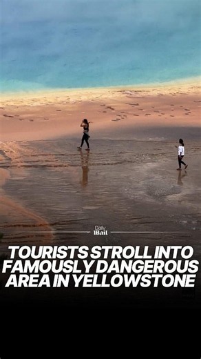 Tourists stroll in forbidden area by dangerous Yellowstone spring
