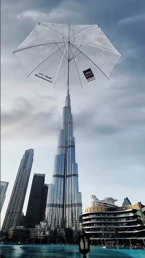 Giant umbrella covers Burj Khalifa! Rain in Dubai #burjkhalifa #travelphotography #travel ##touris