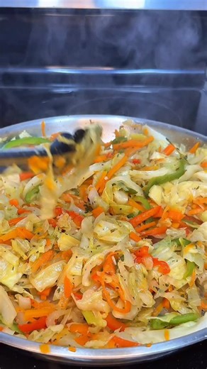 Steamed Cabbage Ingredients: • 1 medium green cabbage, chopped or shredded • 1 large carrot, julienned or thinly sliced • ½ bell pepper (red or green), thinly sliced • ½ onion, thinly sliced • 2–3 stalks scallions, chopped • 2 garlic cloves, minced • 1 sprig thyme (or ½ tsp dried thyme) • 1 Scotch bonnet pepper (whole, for flavor – don’t burst unless you want it spicy!) • 2 tbsp butter or oil • 2 tbsp water or vegetable broth (optional) • Salt and black pepper to taste • 1 tsp all-purpose season