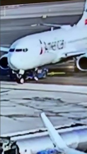 Plane runs over tractor at LaGuardia airport | USA TODAY #Shorts