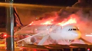 Fire rips through plane with 176 onboard moments before take-off in S. Korea