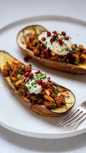 Spiced Lamb Stuffed Eggplants & Tahini Skyr Sauce...growing up with a Syrian dad, stuffed eggplant is something I grew up eating in many different forms but these also reminded me a bit of a Mexican dish we have in the month of September called chiles en nogada with the spices, herbs and pomegranate topping! So this is kind of a marriage between my 2 cultures. I used @icelandicprovisions skyr for the sauce, as by now you should know it is my absolute favorite yogurt because of how luxuriously th