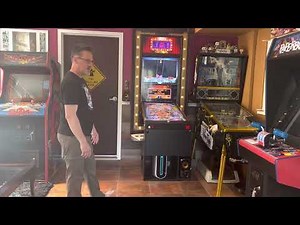 Opening the folding virtual pinball table and putting it away again.