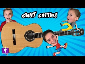 GIANT Guitar at a Museum with HobbyKidsTV - Videos For Kids