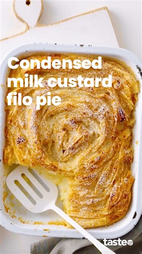 This condensed milk filo pie looks fancy, but is actually so easy and foolproof! All it takes is a bit of folded and scrunched filo, layered in an oven dish, and sweetened condensed milk custard poured over. Bake until set and you’ll have golden, crispy pastry edges and a creamy centre. Yum!⁣ ⁣ If you’d like this recipe, Google ‘Taste Condensed milk custard filo pie’.⁣ ⁣ Recipe by @mummatrad. ⁣ ⁣ #filopastry #custardpie #homemadepie #condensedmilkdessert | Taste.com.au