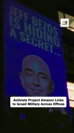 Activists in Denmark just targeted Amazon to highlight the company's links to the Israeli government. The team from Greenpeace Denmark projected the faces of Jeff Bezos and Benjamin Netanyahu onto the building of Amazon Web Services on Black Friday as part of the Make Amazon Pay campaign resisting genocide and worker exploitation. Activists from Luxembourg delivered the same message across Amazon's European headquarters too. | Novara Media
