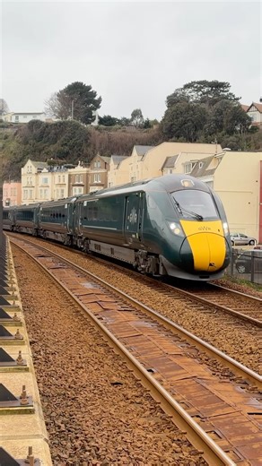 GWR class 800 accelerates down marine parade Dawlish on the Penzance to Paddington 800 315 IET