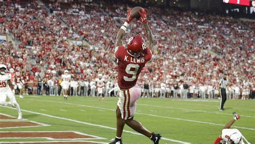 Oklahoma WR Keontez Lewis leaves game after headfirst collision with brick barrier