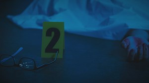 Crime scene with a bloody body and evidence around - Free Stock Video