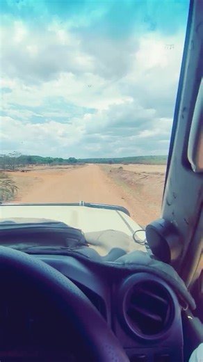 Exploring a Dusty Dirt Road: A Driver's Perspective