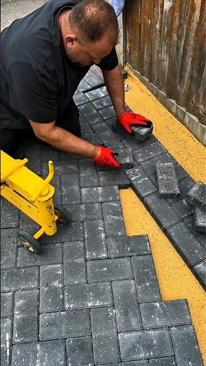“Professional Paver Installation | Brick Laying Technique Using a Manual Block Cutter”