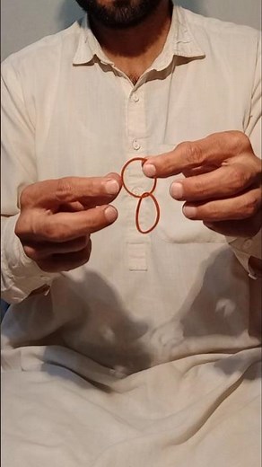 Two Rubber Bands Linked Without Cutting