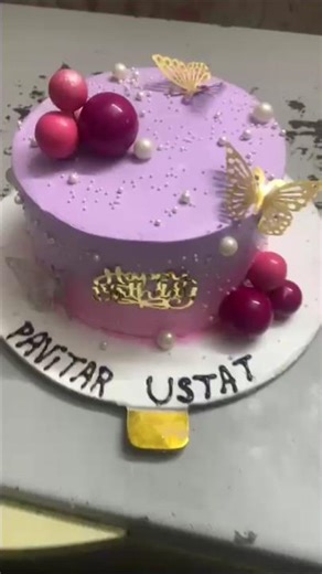 purple and pink cake and butterfly cake and balls