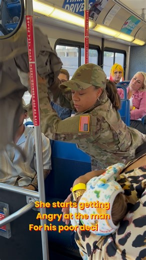 Military woman stands up for passenger on bus with baby. | Ebony M