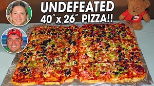 NEW VIDEO!! This was the main event that Katina Eats Kilos and I went up to Alaska for!! The undefeated 10lb "Garbage Can" Alaskan 40-inch Pizza Challenge at Riverside Pizzaria in Nenana, Alaska which is about 1 hour away from Fairbanks, AK. Katina and I had 45 minutes to finish a massive thick-crust 40-inch by 26-inch 6-topping pizza covered with 4 meats and 2 healthy vegetables. We were trying to become the first team to win and get our $50 pizza free plus sweet t-shirts. BIG thanks to Katina 