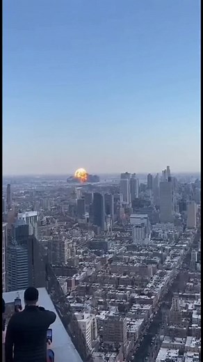 3.7K views · 43 reactions | A normal city morning turned into chaos in seconds! From a rooftop, you can see a huge factory explode in the distance — fire, smoke, and debris everywhere. People on other rooftops are filming in disbelief.  Click the first comment to see the full story. | Free World | Facebook